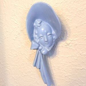Vintage wall pocket blue lady in bonnet